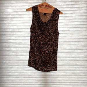 Anne Taylor’s sleeveless blouse